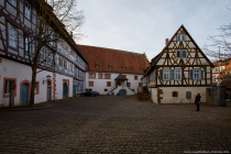 Der Vorgängerbau der Burg Michelstadt aus dem zehnten Jahrhundert war einst der Grundstein für die Stadt Michelstadt. Im Jahre 1307 wurde der Bau zerstört und im Wesentlichen im 14. Jahrhundert wiederaufgebaut. Ab dem Wiederaufbau wird die Burganlage nur noch als Kellerei bezeichnet, welches ein Dokument aus dem Jahre 1532 belegt. Die Kellerei diente als Residenz der Grafen zu Erbach und mit der Errichtung von neuen Gebäuden wandelte sich die Burganlage zu Wohn-, sowie Verwaltungszwecke. In der Kellerei wurden die Naturalabgaben an die Grafen eingekellert.